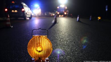 Warnlampe auf der Fahrbahn zur Kontrollstelle