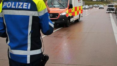 Polizei Rettungswagen Regen